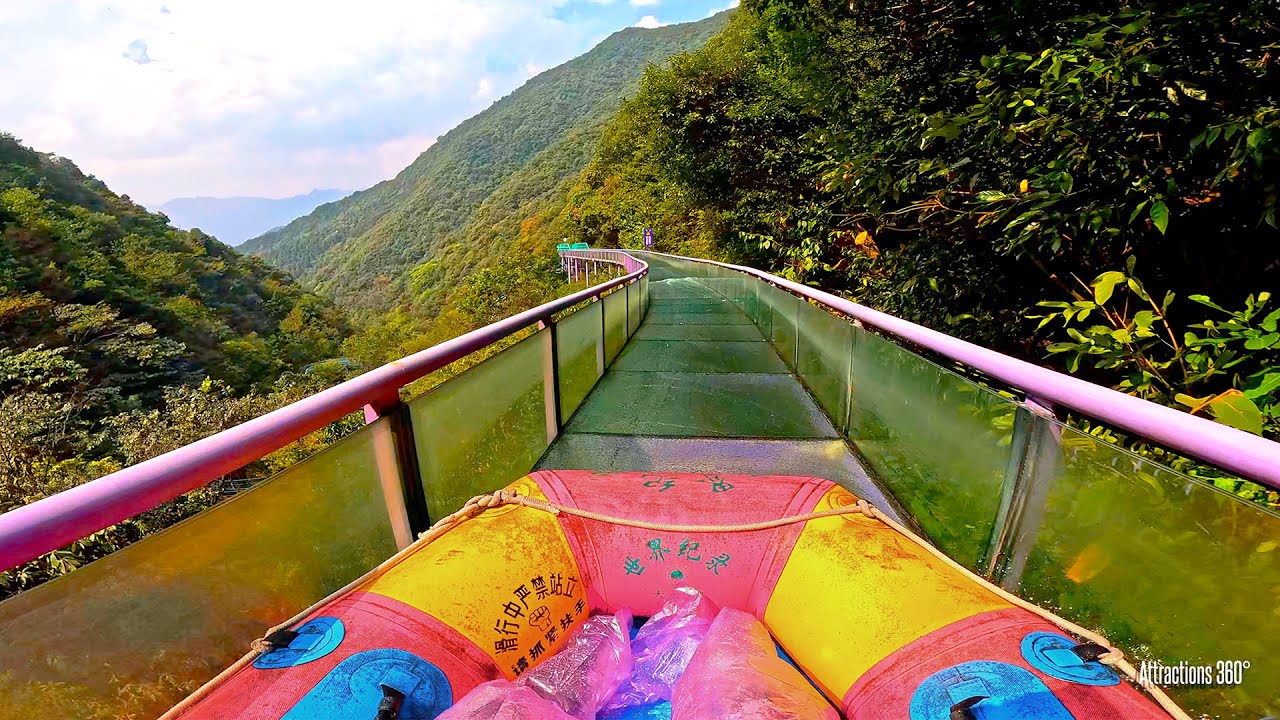 World’s longest glass water slide drops nearly 1.4 miles down a Chinese mountain